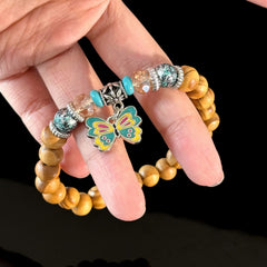 Gemini Zodiac Wooden Bead Bracelet with Butterfly Charm