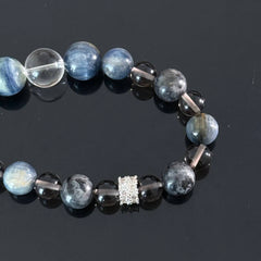 Handmade Kyanite and Smoky Quartz Crystal Bracelet – A natural healing gemstone bracelet that brings protection, clear thinking, and inner peace.