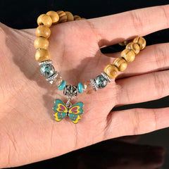 Gemini Zodiac Wooden Bead Bracelet with Butterfly Charm