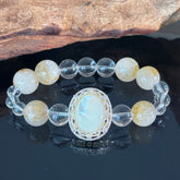 Handcrafted Titanium Quartz & Opal Crystal Bracelet — A White Crystal Healing Bracelet Featuring Gold-Rutile Titanium Quartz and an Oval Opal Pendant
