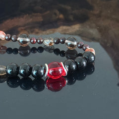 Handcrafted Obsidian and Red Crystal Beaded Bracelet — A Bracelet for Protection, Energy Balance, and Healing