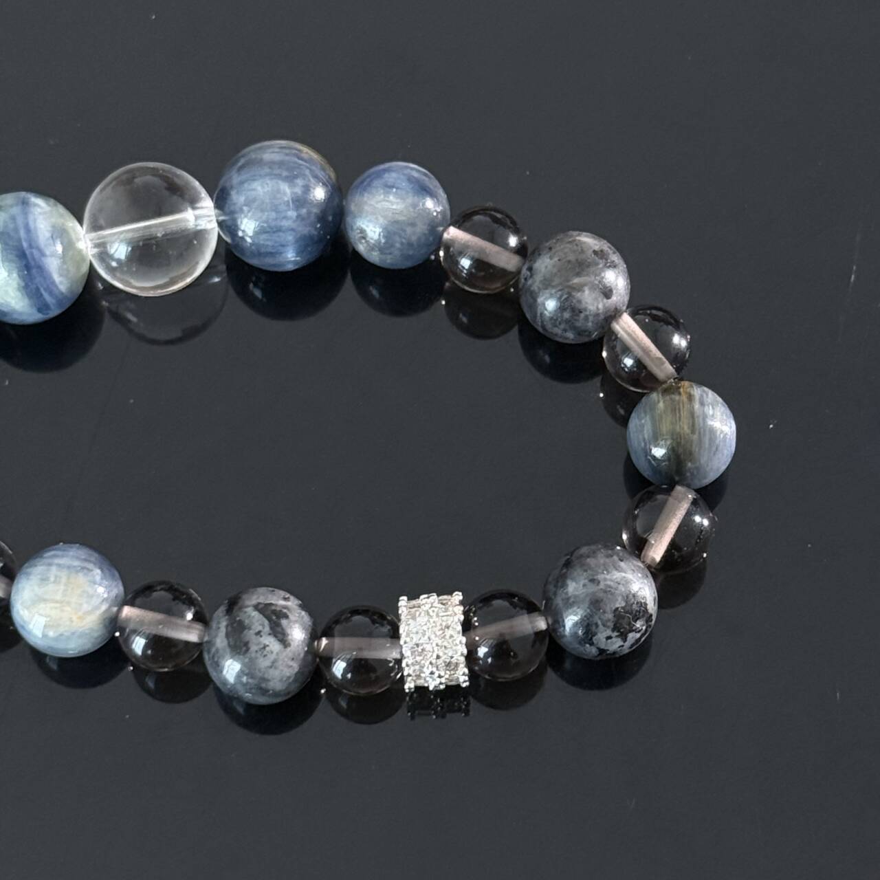 Handmade Kyanite and Smoky Quartz Crystal Bracelet – A natural healing gemstone bracelet that brings protection, clear thinking, and inner peace.